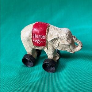 Cast Iron Jumbo Circus Elephant  pull toy and bank. 1950’s vintage